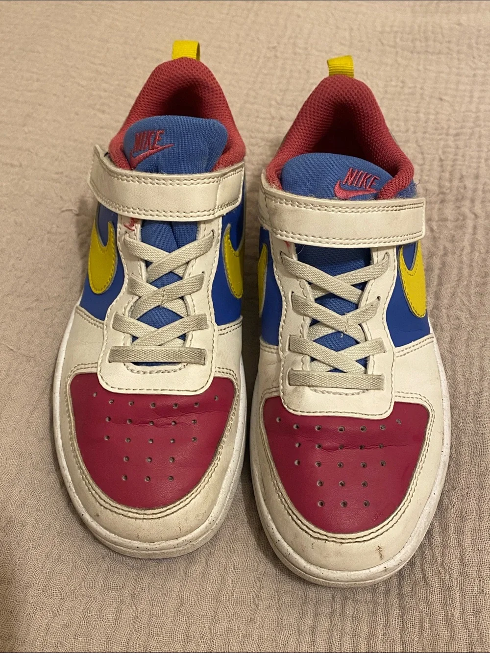 Nike Kids Low-Top Sneakers in White, Blue, Pink & Yellow. Size 13.5